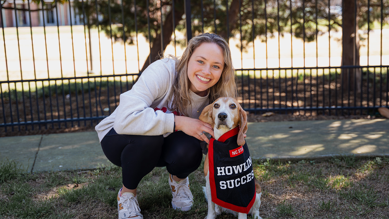OUR Ambassador Jess Schinsky poses with her dog for DASA Howling Success